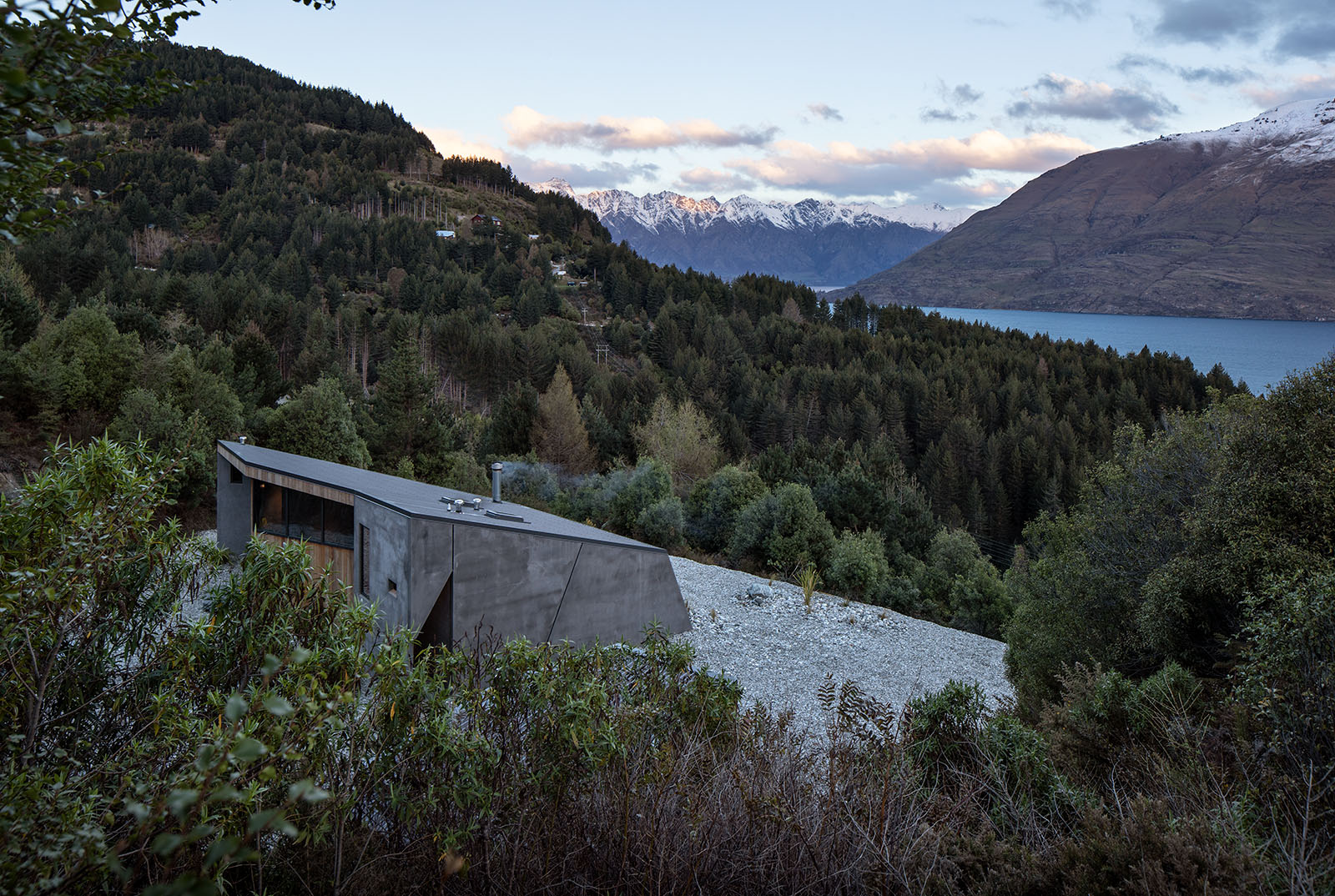 *Digital Process : Kahn@Pixsolution.co.nz coloured concrete building looks like rock in forest.
