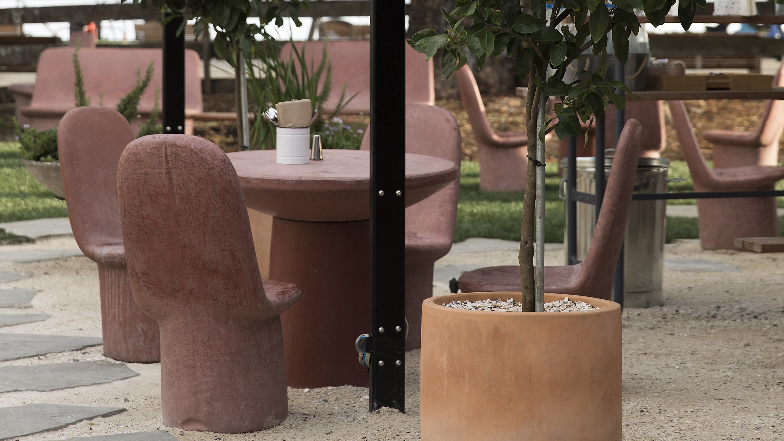 red chairs made from coloured concrete.