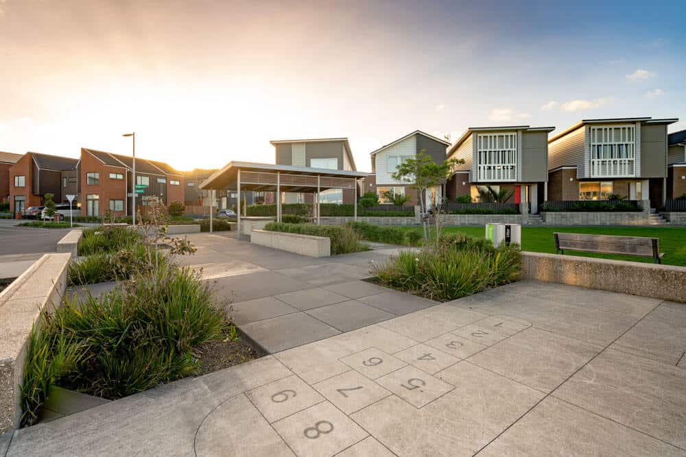 coloured-concrete-public-space-H-ville-Park coloured concrete paths in a playground