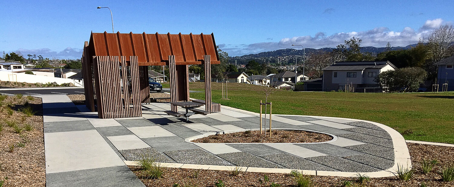 coloured-concrete-public-space-Tiverton-Reserve-2 Coloured concrete paths in a park in New Zealand.