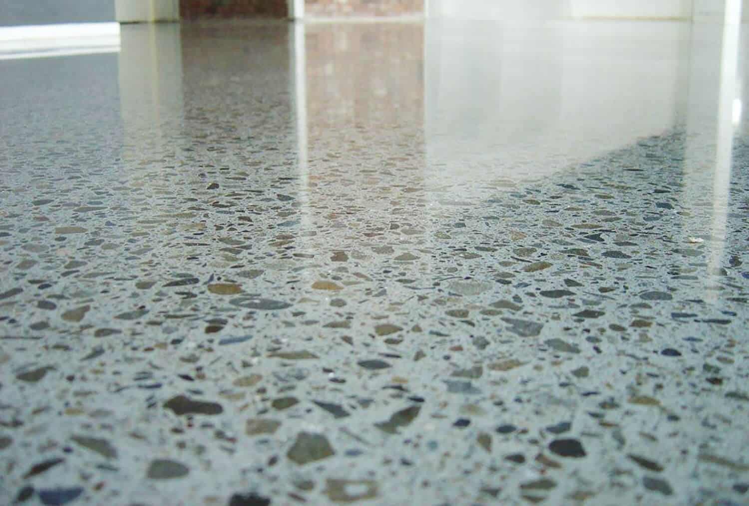 coloured-concrete-rejuvenate-concrete-2 polished concrete floor looks super shiny after being cleaned and sealed