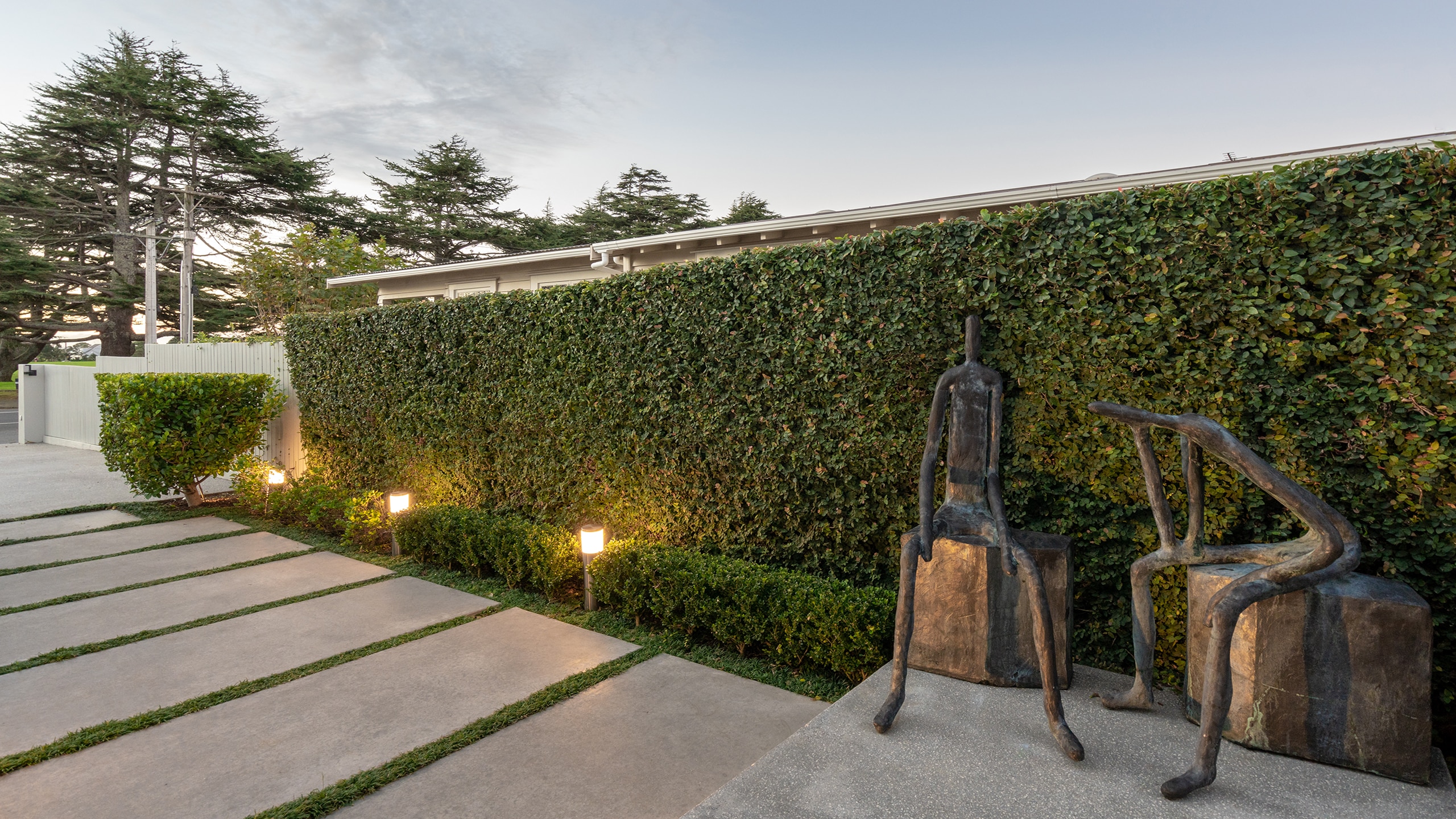 f16-PFL-PH-House-HIGH-Res-10 coloured concrete patio and path through a garden