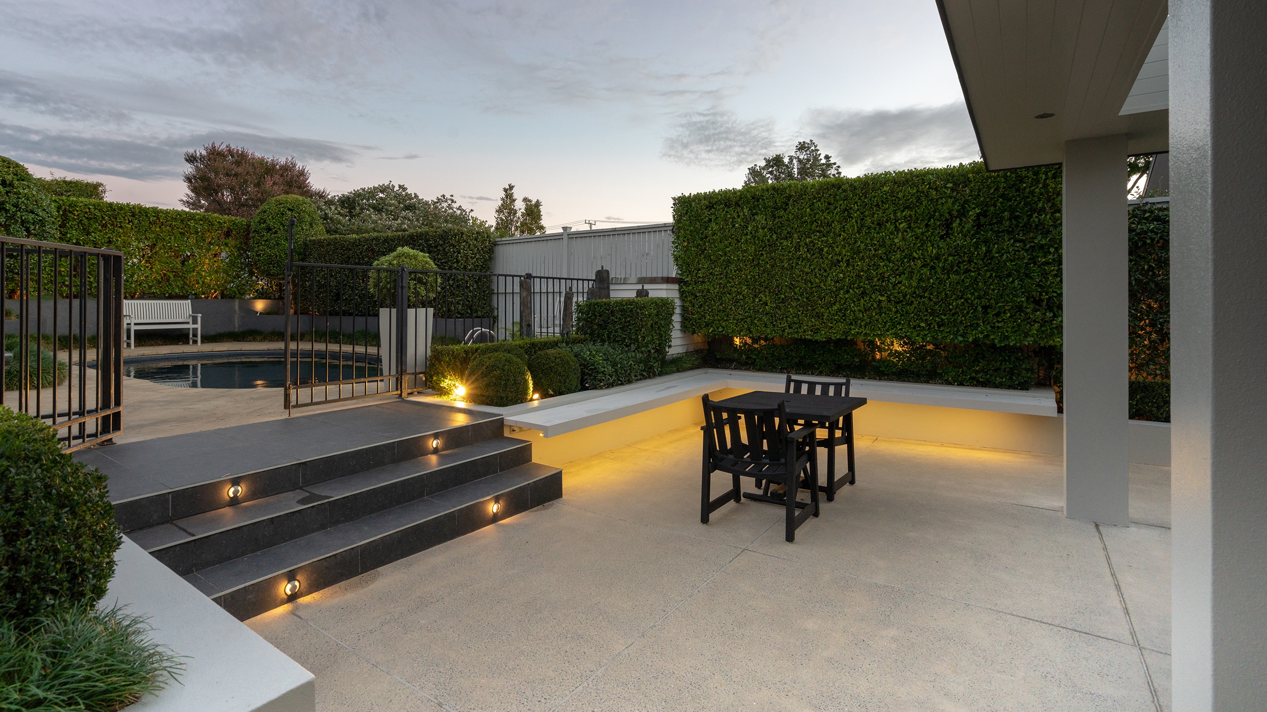 concrete patio and pool surround