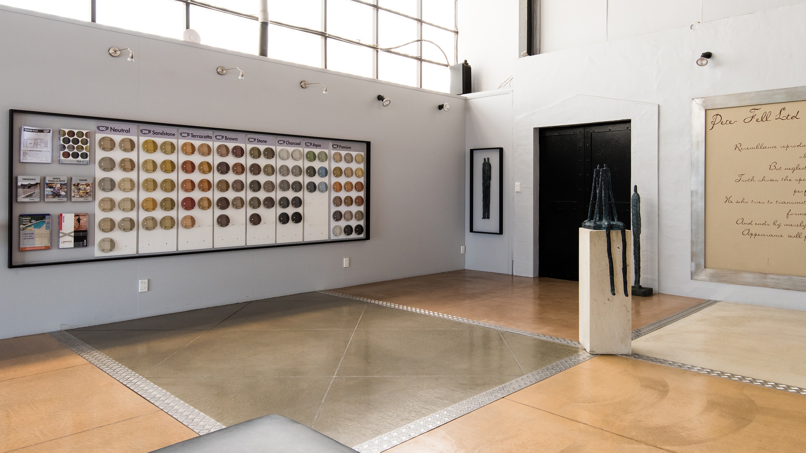 coloured concrete samples and polished floor slabs in PeterFell Showroom