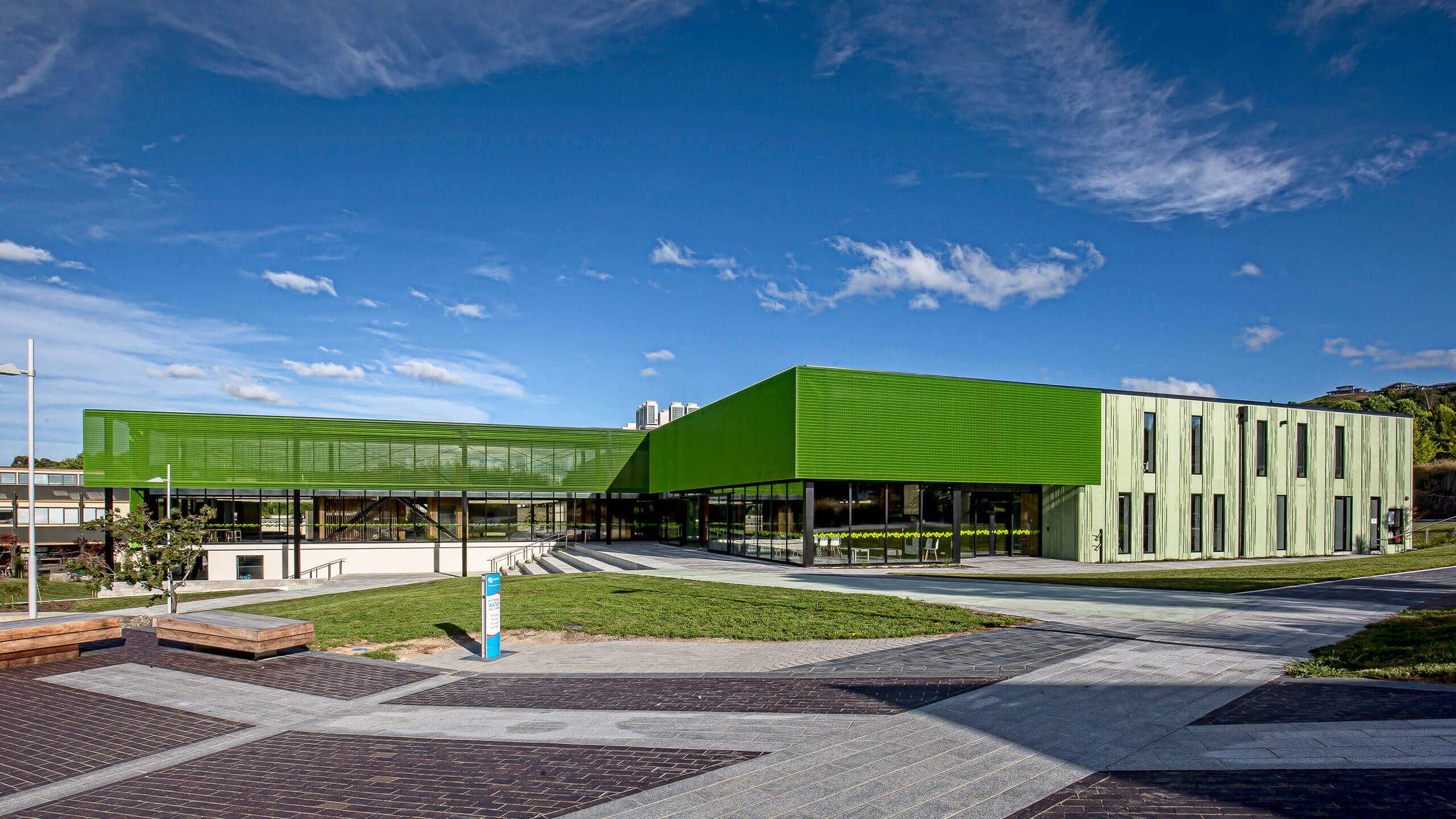 green-coloured-concrete-wall-commercial-exterior